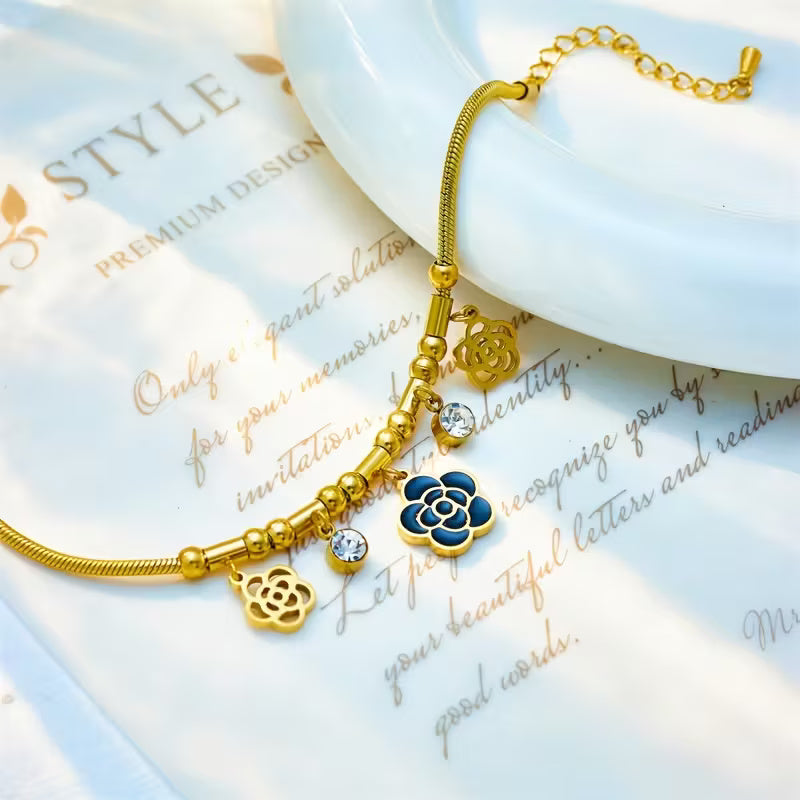 Golden Camellia Bloom Charm Bracelet with Crystal Accents